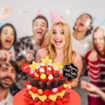 young-friends-with-birthday-cake_23-21477202262
